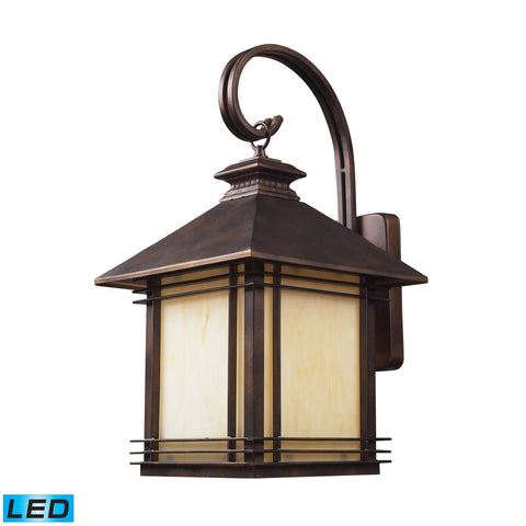 1 Light Outdoor Wall Sconce In Hazelnut Bronze - LED Offering Up To 800 Lumens (60 Watt Equivalent) With Full Range Dimming. Includes An Easily Replaceable LED Bulb (120V).