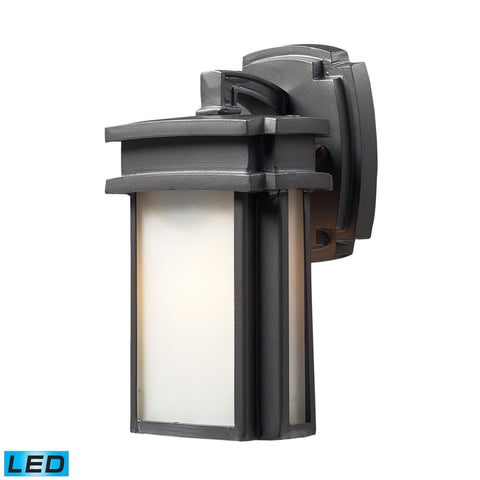 1- Light Outdoor Sconce In Graphite - LED Offering Up To 800 Lumens (60 Watt Equivalent) With Full Range Dimming. Includes An Easily Replaceable LED Bulb (120V).