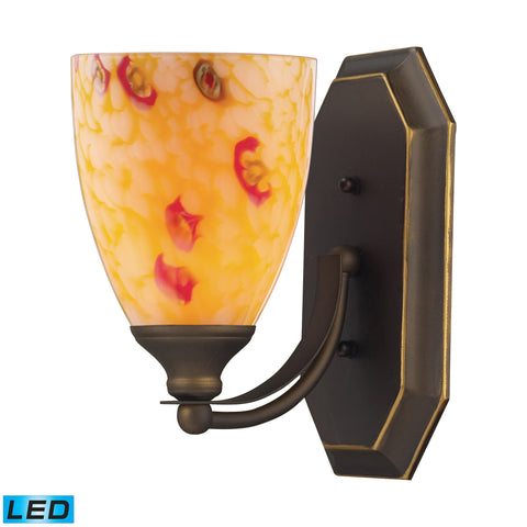 1 Light Vanity In Aged Bronze And Yellow Blaze Glass - LED Offering Up To 800 Lumens (60 Watt Equivalent) With Full Range Dimming. Includes An Easily Replaceable LED Bulb (120V).