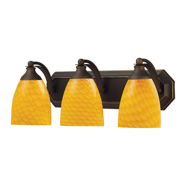 3 Light Vanity In Aged Bronze And Canary Glass