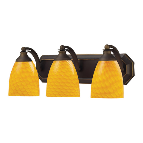 3 Light Vanity In Aged Bronze And Canary Glass