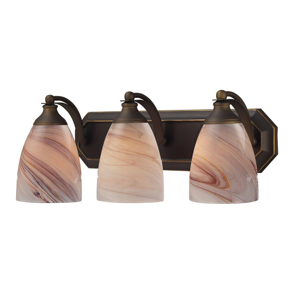 3 Light Vanity In Aged Bronze And Creme Glass
