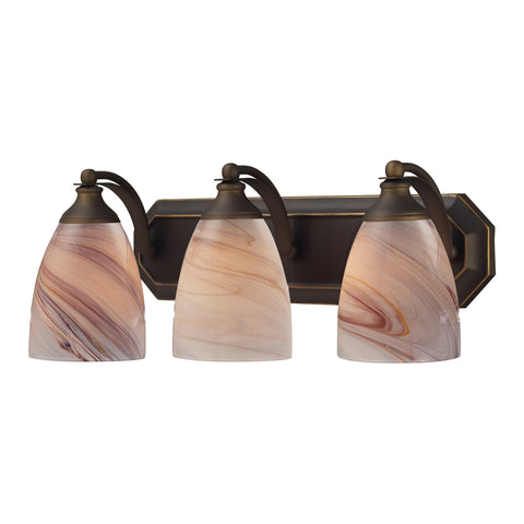 3 Light Vanity In Aged Bronze And Creme Glass