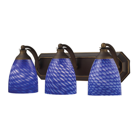 3 Light Vanity In Aged Bronze And Sapphire Glass