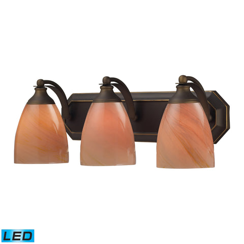 3 Light Vanity In Aged Bronze And Sandy Glass - LED, 800 Lumens (2400 Lumens Total) With Full Scale Dimming Range, 60 Watt (180 Watt Total)Equivalent , 120V Replaceable LED Bulb Included
