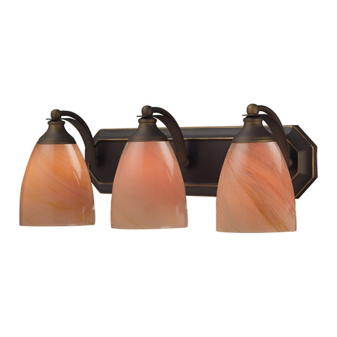 3 Light Vanity In Aged Bronze And Sandy Glass
