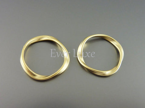 Abstract twisted ring pendants